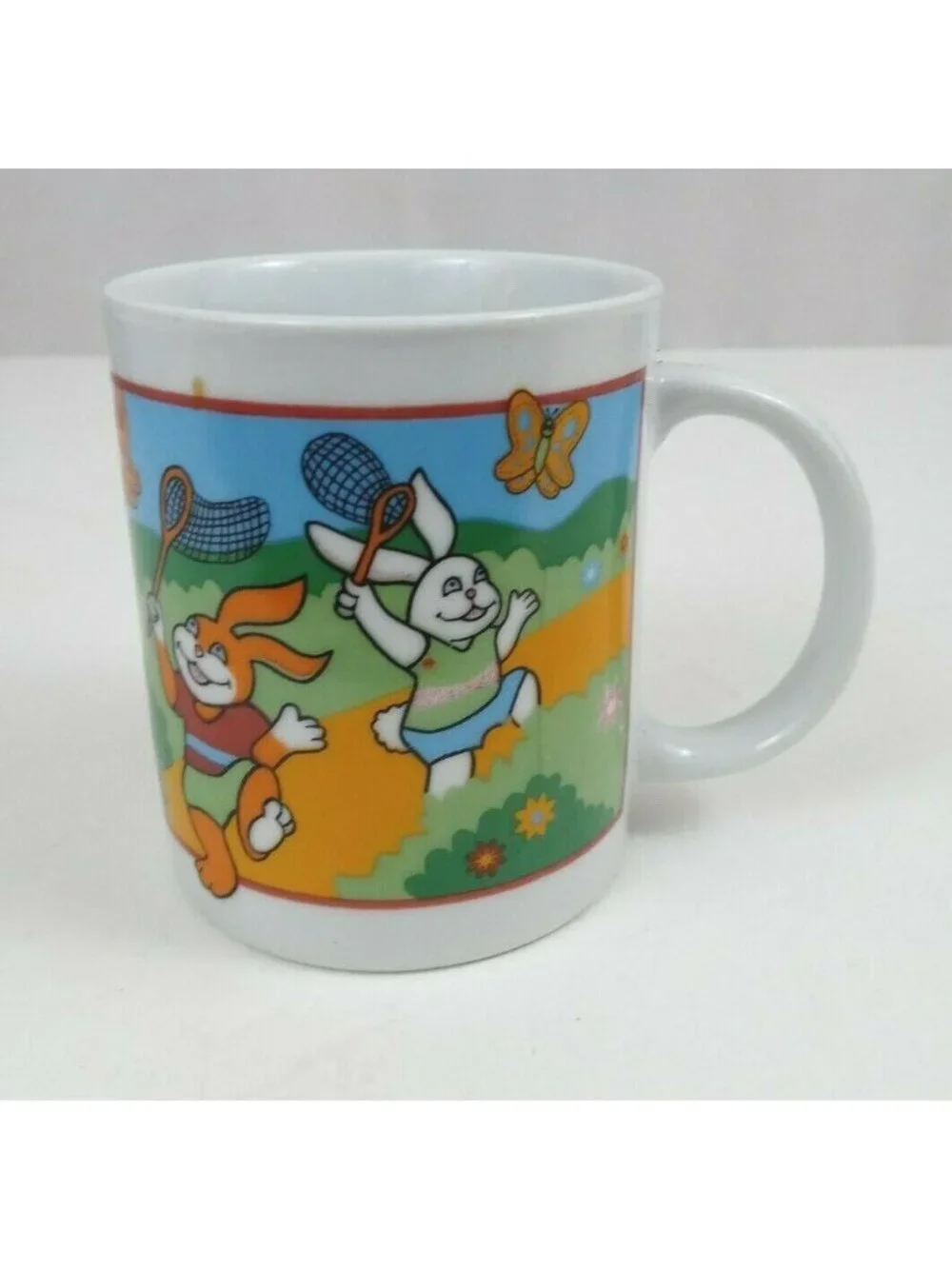 Vintage Easter Bunny Catching Butterflies Coffee Mug Cup 3.75
